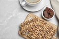 Delicious rice crispy treats on light grey table. Space for text Royalty Free Stock Photo