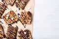 Delicious rice crispy treats on white wooden table. Space for text Royalty Free Stock Photo