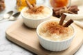 Delicious rice pudding with cinnamon on board Royalty Free Stock Photo