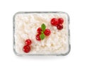 Delicious rice pudding with cranberry in glass bowl on white background Royalty Free Stock Photo