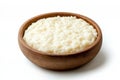Delicious rice pudding served in a rustic wooden bowl on a clean white background Royalty Free Stock Photo