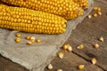 Delicious ripe corn cobs on wooden table Royalty Free Stock Photo