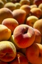 Delicious ripe peaches for sale at an urban street market
