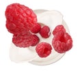 Delicious ripe raspberries falling into bowl with yogurt on background, top view Royalty Free Stock Photo