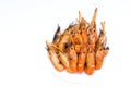 Delicious river prawns burnt on a white background