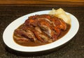 Delicious Roast Duck on stone background