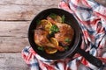 Delicious roasted duck leg with oranges close-up. top view Royalty Free Stock Photo