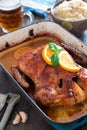 Delicious roasted duck with oranges in a pan, rustic style Royalty Free Stock Photo