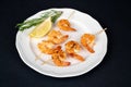 Delicious roasted shrimps on skewers