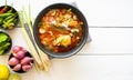 Delicious salad canned fish with vegetables of herbs, lemon, lemongrass, kaffir lime leaves, Shallot, pepper.  thai food top view Royalty Free Stock Photo