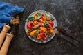 delicious salad with mussels, vegetables and jamon on black Royalty Free Stock Photo