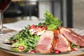 Delicious salad with roasted duck breast on plate Royalty Free Stock Photo