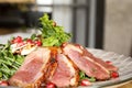 Delicious salad with roasted duck breast on plate Royalty Free Stock Photo