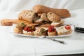 Delicious salads made from the sweet pepper, eggplant, tomatoes on sliced bread. Royalty Free Stock Photo