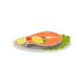 Delicious salmon fish with slices of lemon and fresh lettuce leaf on ceramic plate. Tasty dish for holiday dinner. Flat