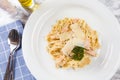 Delicious salmon pasta dish, tagliatelle noodles with Parmesan and parsley Royalty Free Stock Photo
