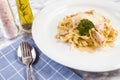 Delicious salmon pasta dish, tagliatelle noodles with Parmesan and parsley Royalty Free Stock Photo