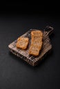 Delicious salted rectangular wheat croutons with salt and spices