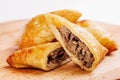 Delicious samosa pies with meat on plate. Menu, restaurant, recipe