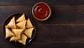 Delicious Samosas on Plate with Sauce and Wooden Background, Copy Space