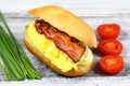 Delicious sandwich with bacon, scrambled egg and lettuce Royalty Free Stock Photo