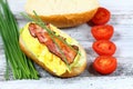 Delicious sandwich with bacon, scrambled egg and lettuce Royalty Free Stock Photo