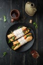 Delicious sandwich with meat with arugula and tomatoes Royalty Free Stock Photo