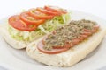 Delicious sausage sandwich with salad Royalty Free Stock Photo