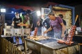 Delicious sausages and chicken grilled on charcoal during Santa Iria Fair in Faro, Algarve, Portugal