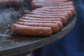 Delicious sausages on the grill for sale