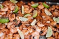 Delicious sauteed shrimp with cajun seasoning and lime on a maple plank