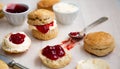 Delicious scones with clotted cream and strawberry jam Royalty Free Stock Photo