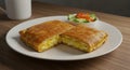 Delicious Scrambled Egg Stuffed Pancake, Served with a Side Salad Royalty Free Stock Photo