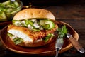 Delicious seafood burger with crumbed fish fillet Royalty Free Stock Photo