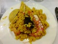 Delicious seafood paella well cooked