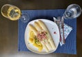 Delicious seasonal white asparagus with creamy mayonnaise, boiled potatoes and sliced ham Royalty Free Stock Photo