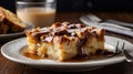 Delicious Bread Pudding Slice with Caramel Sauce Served with Beverage Royalty Free Stock Photo