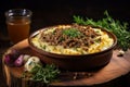 Delicious shepherds pie with minced meat and mashed potatoes for restaurant menu. Royalty Free Stock Photo