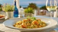 Delicious shrimp risotto dish by the sea at sunset Royalty Free Stock Photo