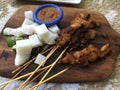 Delicious Singapore Satay with Ketupat and peanut sauce Royalty Free Stock Photo