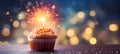 Delicious single chocolate cupcake with sparkler and hearts bokeh lights on a magical background Royalty Free Stock Photo