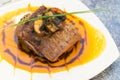 Delicious sirloin steak placed upon a bed of curry Royalty Free Stock Photo