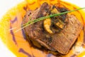 Delicious sirloin steak placed upon a bed of curry