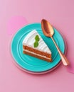 Delicious slice of carrot cake with cream frosting on a vibrant plate Royalty Free Stock Photo