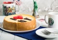 Delicious whole new york cheesecake with word on white background. Sweet and tasty food, coffee break concept. Classic america