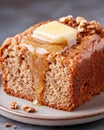 Delicious slice of walnut bread with butter and syrup. Royalty Free Stock Photo
