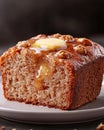 Delicious slice of walnut loaf cake with butter. Royalty Free Stock Photo