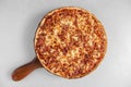 Delicious sliced pizza on wooden board Royalty Free Stock Photo