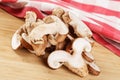 Delicious Sliced Shiitake Mushrooms isolated on a wooden background Royalty Free Stock Photo