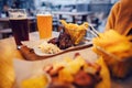 Delicious smoked sausage with chips, french fries and steak with Royalty Free Stock Photo